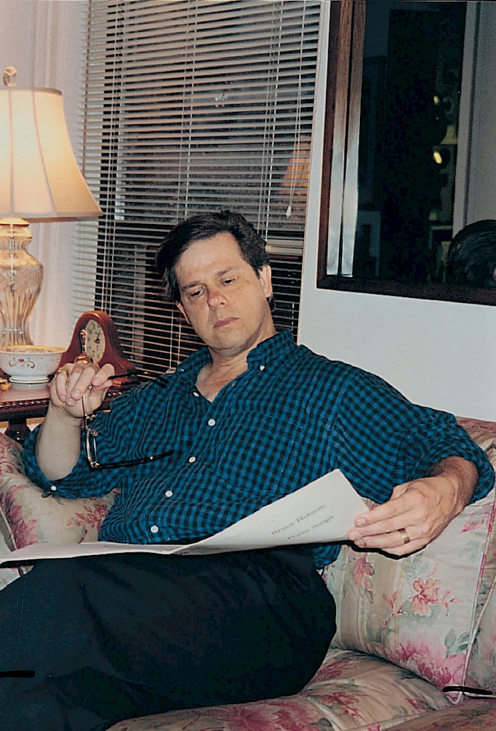 Jan Opalach studying his copy of Three Songs